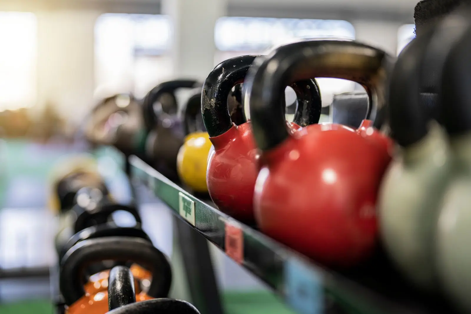 Kettlebells racked in weight order